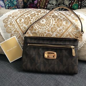 Micheal Kors signature wristlet new! Authentic